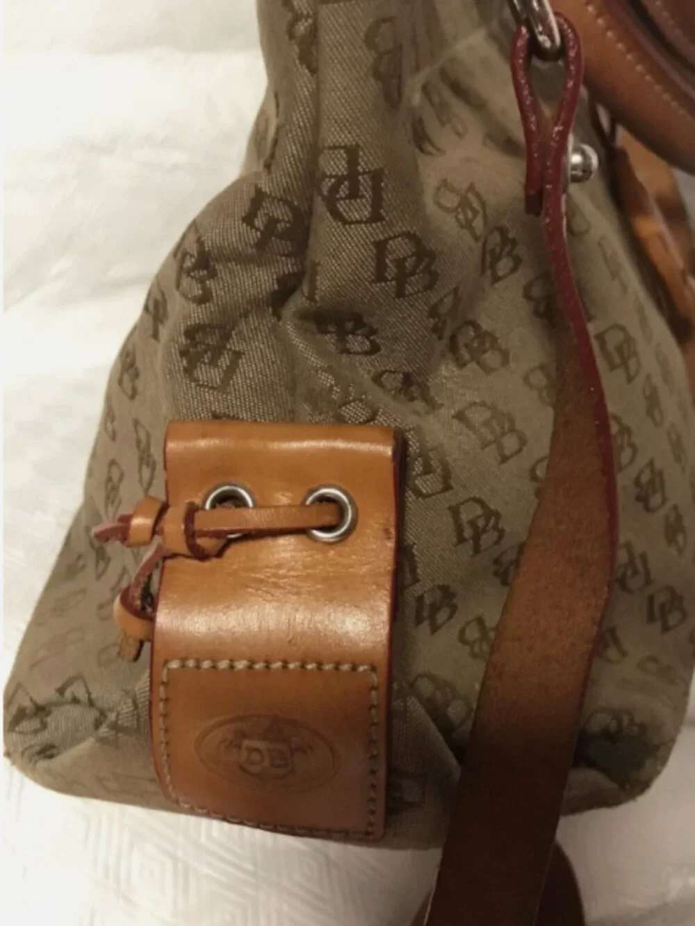 VINTAGE DOONEY AND BOURKE SIGNATURE TASSEL CANVAS LEATHER SHOULDER BAG